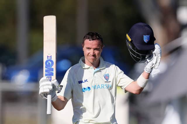 Nick Larkin of New South Wales celebrates after reaching his century during day two of the Sheffield Shield. (Photo by Daniel Kalisz/Getty Images)