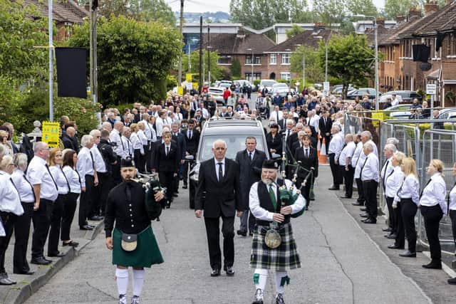 The funeral procession of senior Irish Republican and former leading IRA figure Bobby Store arrives at St Agnes' Church in west Belfast