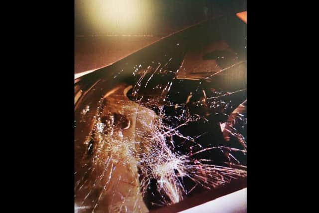 Car damaged in attack.