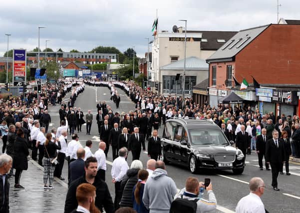 The funeral of senior republican Bobby Storey which took place on June 30 at St. Agnes' Church, Belfast. The funeral procession left the church before heading to Milltown Cemetery, where he was buried in the Republican Plot. Gerry Adams gave an oration in the cemetery. The funeral was attended by leading republicans and senior Sinn Fein members. 
PPhoto: Pacemaker Press