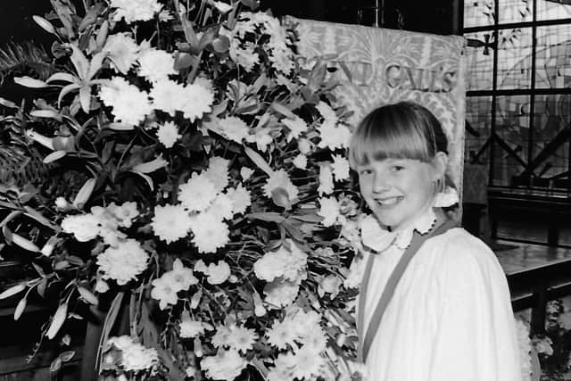Pictured in October 1987 is Karen Fraser, 11, of Bangor who was a member of St Gall's Parish Church, Carnalea, Bangor, to mark the church's 25th anniversary Harvest Thanksgiving. Picture: News Letter archives