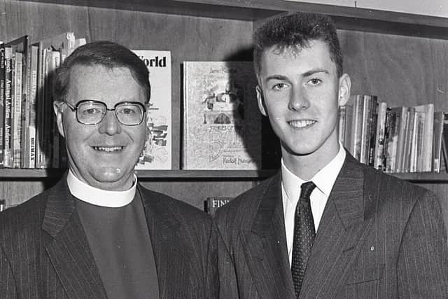 Moderator of the Presbyterian Church in Ireland Dr Godfrey Brown presents his son Andrew with his A-Level certificates at the the prize day at Ballycastle High School in Co Antrim in December 1988. Picture: News Letter archives