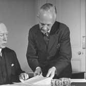 The Prime Minister of Northern Ireland Lord Craigavon speaking with Mr Robert Gransden the Secretary to the Cabinet in 1940