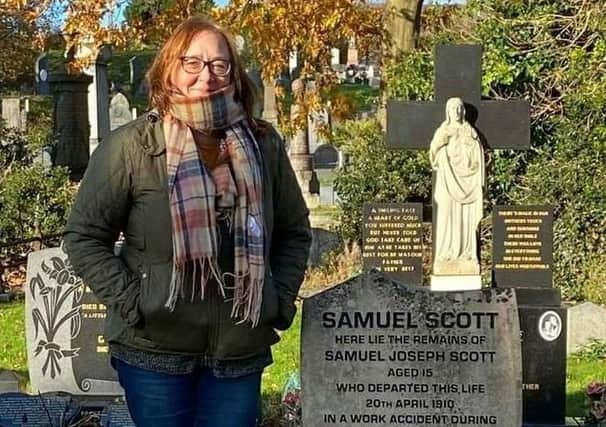 Jeanette Lunn pictured at the supposed grave of Samuel Joseph Scott