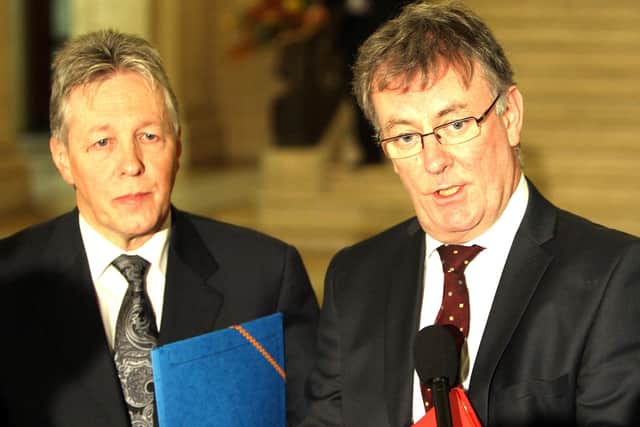 Peter Robinson and Mike Nesbitt talk to the media fter the first meeing of the Unionist Forum in 2013