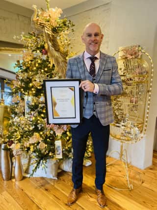 Jason Foody, General Manager of Killeavy Castle Estate with the award