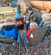 Huddling around the fire on a cold December day
