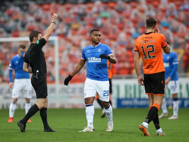 Rangers' Alfredo Morelos is booked by match referee Steven McLean