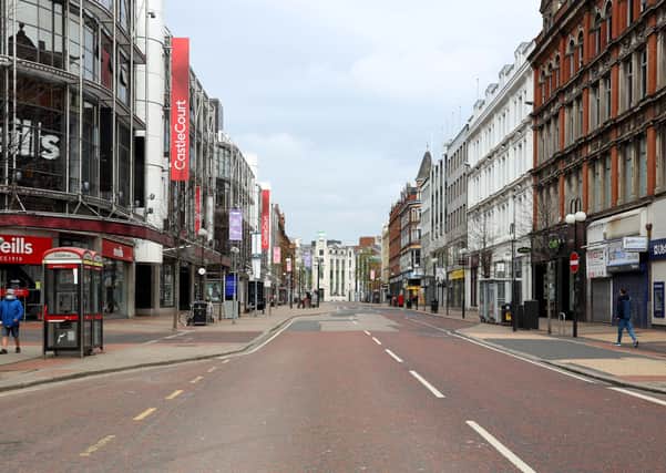Belfast City Centre was virtually empty when this photo was taken in March due to Covid, but some believe vaccine passports could help restore normality. 
Photo Pacemaker Press