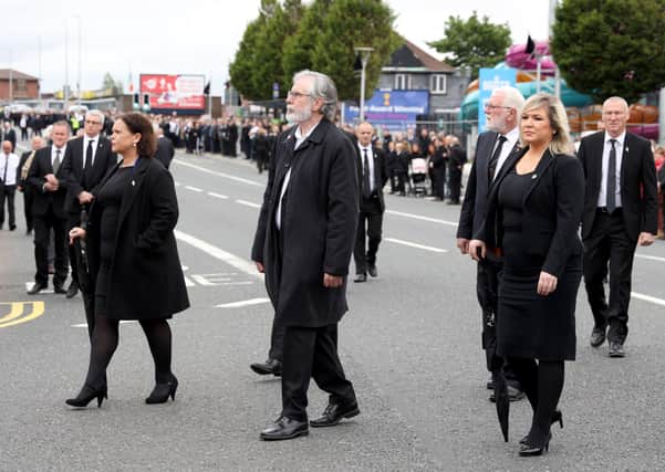 Sinn Fein leaders were among the hundreds of people who turned out for the funeral of Bobby Storey