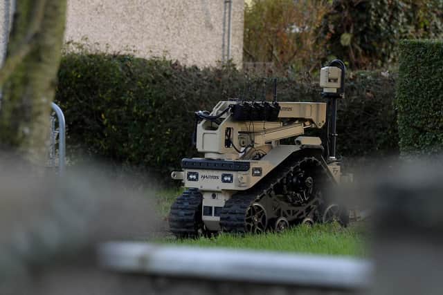 Army technical pictured at a scene in Lisburn of a suspected package that has been left at a property in  area of Glenmore Park in  Lisburn this morning 

Mandatory Credit Presseye /Stephen Hamilton