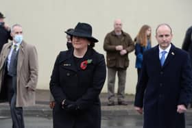 The Taoiseach Micheál Martin, right, in Enniskillen on Remembrance Sunday last month with Arlene Foster MLA, the Northern Ireland First Minister. One of Mr Martin's uncles was a British Army prisoner of wary (POW) in Japan in World War II. He is a pluralists but many unionits distrust his all island unit. Photo: Press Eye