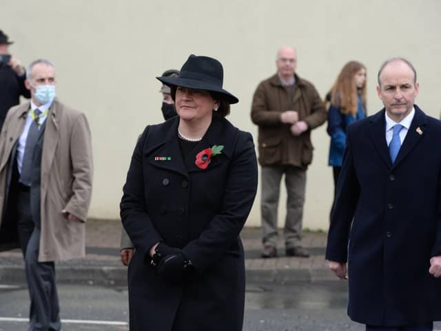 The Taoiseach Micheál Martin, right, in Enniskillen on Remembrance Sunday last month with Arlene Foster MLA, the Northern Ireland First Minister. One of Mr Martin's uncles was a British Army prisoner of wary (POW) in Japan in World War II. He is a pluralists but many unionits distrust his all island unit. 

Photo: Press Eye
