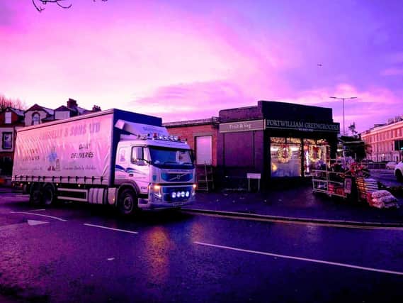 A lorry belonging to Brendan Donnelly’s firm delivering to a greengrocer’s shop in north Belfast recently