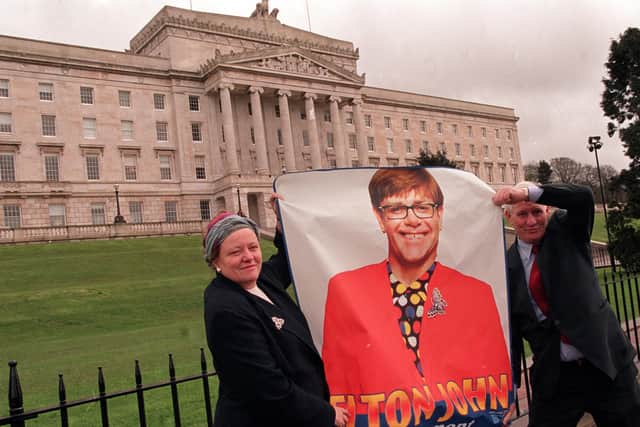 Secretary of State Mo Mowlam with legendary promoter Jim Aiken to promote Elton John’s Stormont concert – part of a very strategic plan