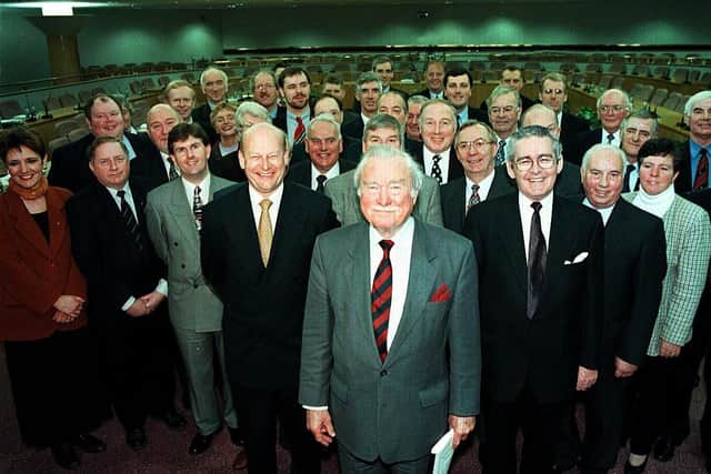 Sir John Gorman, front, pictured with members of the Forum