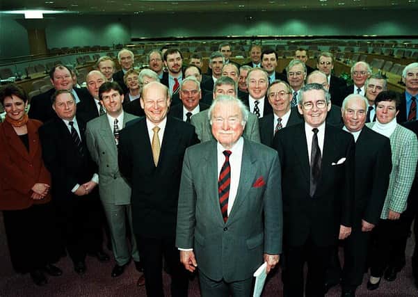 Sir John Gorman, front, pictured with members of the Forum