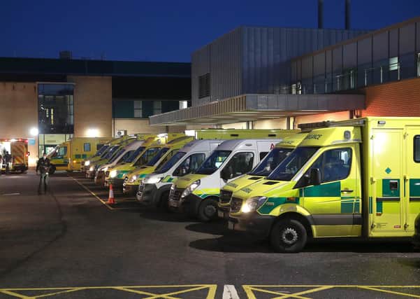 Ambulances, many with patients inside, had to queue outside Antrim Area Hospital earlier this month