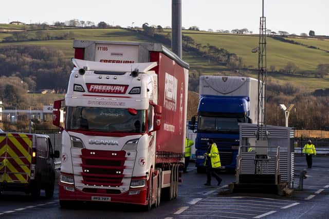Lorries leave the Stena Line terminal at Belfast Harbour yesterday after the Brexit transition period came to an end