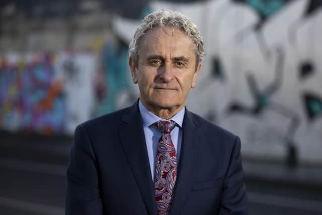 Paddy Harte, Chairman of the Board of the International Fund for Ireland at Belfast's Peace Walls