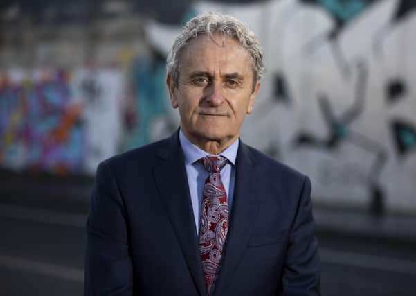 Paddy Harte, Chairman of the Board of the International Fund for Ireland at Belfast's Peace Walls