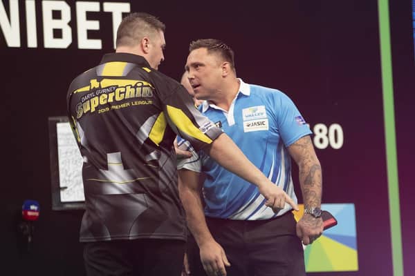 Things get heated at the end of the Premier League match between Daryl Gurney and Gerwyn Price in Sheffield in 2019 as referee, George Noble and security have to intervene.