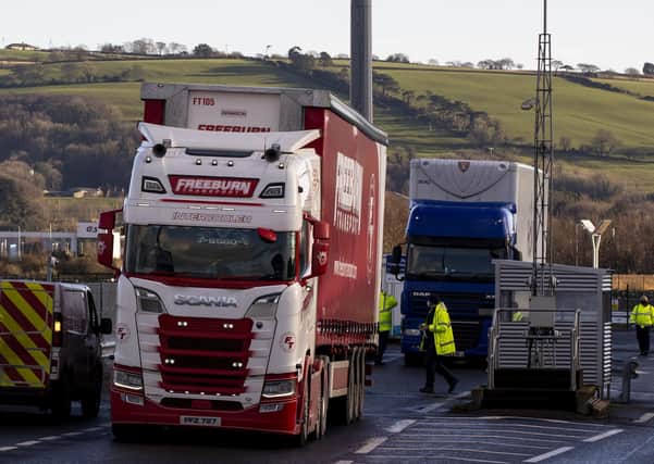 Lorries leave the Stena Line terminal at Belfast Harbour, as the UK leaves the single market and customs union and the Brexit transition period comes to an end.