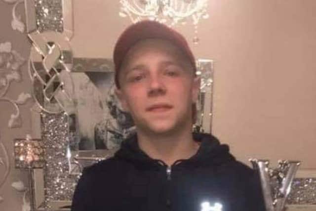 West Belfast teenager 
Conor Kerr was decribed as "a dearly beloved son".