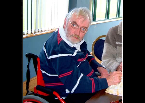 An image of Sean Hughes attending a painting class at the Disabled Police Officers Association in March 2006