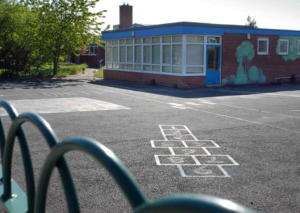 A shut school and playground. Children need to be at school, for their social, emotional and mental development, says Hugh McCarthy