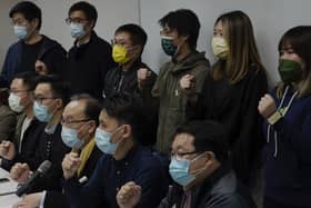 Pro-democratic party members shout slogans in response to the mass arrests during a press conference in Hong Kong yesterday, Wednesday, Jan. 6, 2021. About 50 Hong Kong pro-democracy figures were arrested by police on Wednesday under a national security law (AP Photo/Vincent Yu)