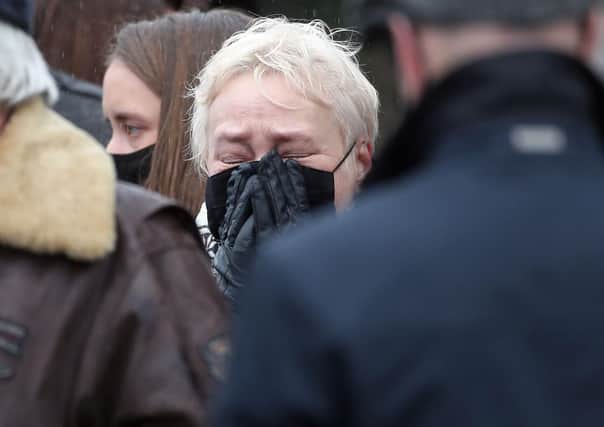 Lucy McIlhatton's mother Anne during the funeral in west Belfast this morning