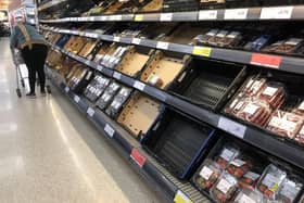 Empty shelves at the Sainsbury's store at the Forestside shopping centre in Belfast