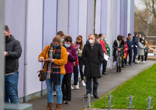 Large queues at the Covid vaccination centre located at The Lakeland Forum, Enniskillen.  Picture: Ronan McGrade/Pacemaker Press