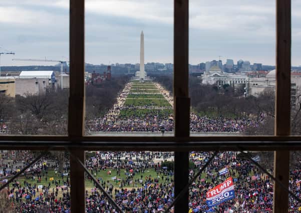 Trump supporters on Wednesday January 6, 2021 outside Capitol Hill in Washington DC, as seen from inside the building, which they stormed