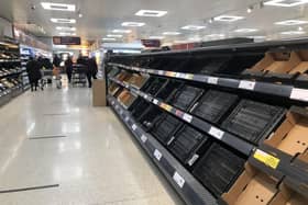 Depleted shelves in Sainsburys at the Forestside shopping centre in Belfast. PA Photo. Picture date: Monday January 11, 2021. Photo: David Young/PA Wire