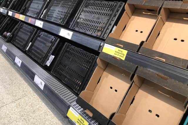 Depleted shelves in Sainsburys at the Forestside shopping centre in Belfast on Monday January 11, 2021. 
Photo credit: David Young/PA Wire