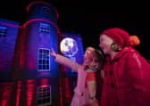 Twins Erin and Miriam, 7, take in the lights at Armagh Observatory and Planetarium