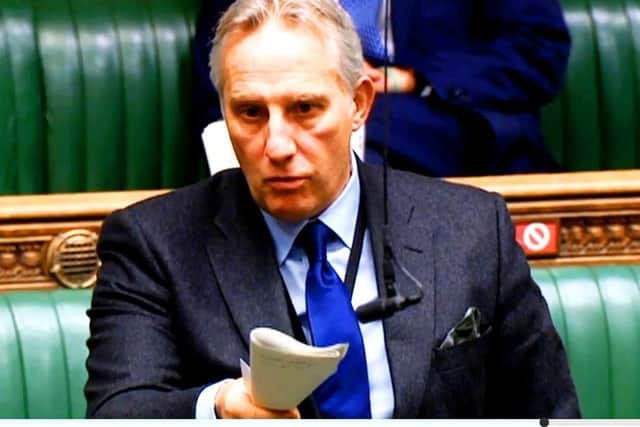 An angry Ian Paisley waving his rolled-up order papers in the House of Commons last week