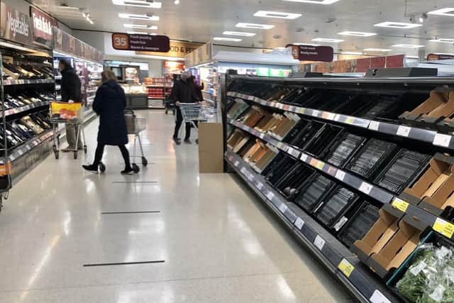 Depleted shelves in Sainsbury's at the Forestside shopping centre in Belfast.