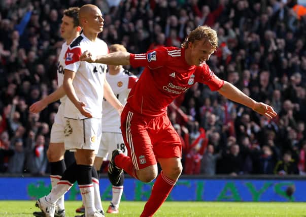 Dirk Kuyt celebrates a goal against Manchester United in 2011. Pic by Getty.
