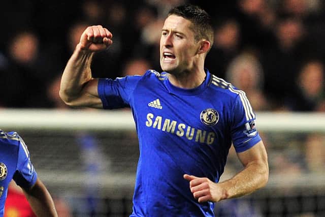 Chelsea's English defender Gary Cahill celebrates scoring their second goal during the English League Cup Fourth Round football match between Chelsea and Manchester United at Stamford Bridge in London, on October 31, 2012. (Photo: GLYN KIRK/AFP via Getty Images).