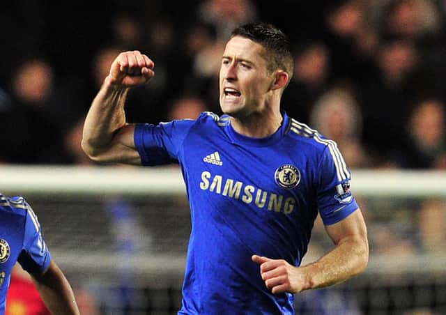 Chelsea's English defender Gary Cahill celebrates scoring their second goal during the English League Cup Fourth Round football match between Chelsea and Manchester United at Stamford Bridge in London, on October 31, 2012. (Photo: GLYN KIRK/AFP via Getty Images).