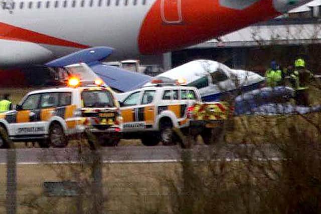 The undercarriage of a plane gave way on landing at Belfast International
Airport this afternoon