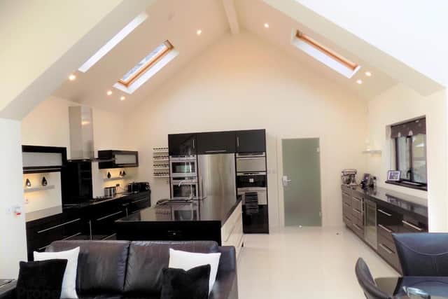 The property has an Open plan Kitchen/Dining and Living area