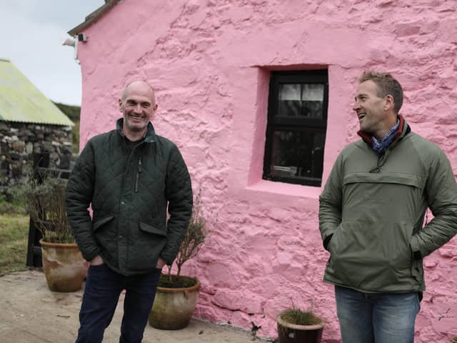 Rauri Morgan with presenter Ben Fogle ouside his cottage on Rathlin Island