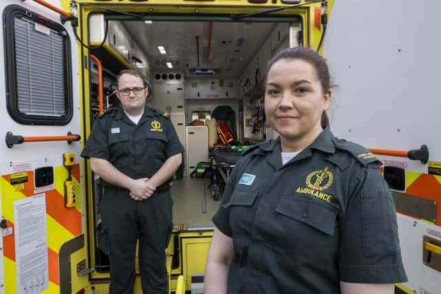 Student EMT Ruth Corscadden (right) and Paramedic Daniel McCollam pose during their shift for the Northern Ireland Ambulance Service covering the Northern Trust's Hospitals. Picture date: Monday January 18, 2021.