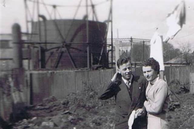 Laurence Sweeney and Gladys Gallinagh with Enniskillen Gas Works in Background. Photo Courtesy Tony Gallinagh