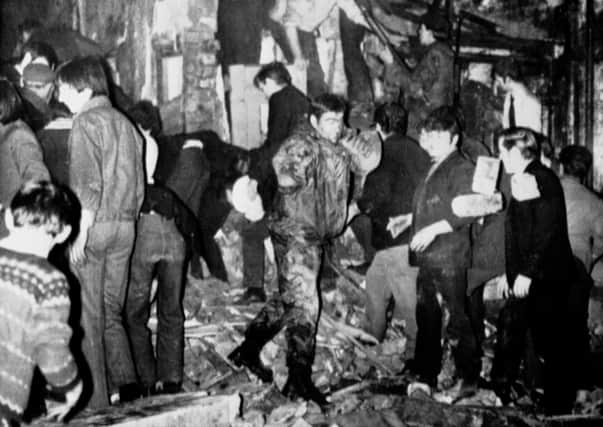 The aftermath of the bomb blast at McGurk's bar, carried out by the UVF,  in North Queen Street, Belfast in 1971. Photo: PA/PA Wire