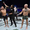 Dustin Poirier reacts after his knockout victory over Conor McGregor of Ireland in a lightweight fight during the UFC 257 event inside Etihad Arena on UFC Fight Island on January 23, 2021 in Abu Dhab. (Photo by Jeff Bottari/Zuffa LLC via Getty Images).